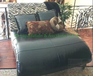 lot 322 image: Curved leather Settee  chaise with matching pillows