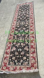 lot 48 image: Persian entry hall rug 31 x 118