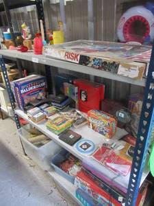 lot 11 image: VINTAGE TOYS, SINGER KNITTING MACHINE, THINK OMINOS, SCATTEGORIES, TRIVIAL PURSUIT, PLAYING CARDS AND VARIOUS BOARD GAMES