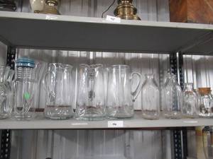 lot 46 image: GLASS PITCHERS, MILK BOTTLES AND GLASS CONTAINERS