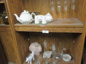 lot 67 image: CERAMIC TEA POT, SUGAR & CREAMER BOWLS WITH SALT & PEPPER SHAKERS, CHAMPAGNE GLASSES, GLASSWARE AND MORE