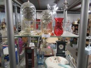 lot 131 image: SHARP CLOCK, ELGIN CLOCK, ROSE COLORED VASES, FOOTBALL HELMET CLOCK AND MORE
