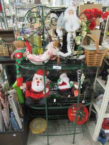 lot 164 image: GREEN BAKERS RACK 36 X 12  X 60 WITH CHRISTMAS DECOR