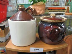lot 174 image: BROWN HULL POTTERY JAR AND WHISKEY JUG CERAMIC COOKIE JAR