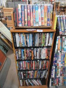 lot 176 image: LARGE ASSORTMENT OF DVDS AND VHS TAPES STAND NOT INCLUDED