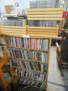 lot 177 image: LARGE ASSORTMENT CDS. SMALL WOOD CARRIERS INCLUDED BUT NOT STAND