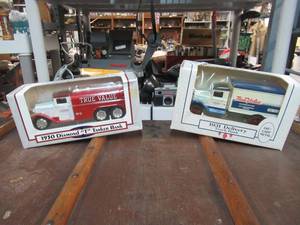 lot 228 image: TRUE VALUE1930 DIAMOND T TANKER BANK AND 1931 DELIVERY TRUCK BANK