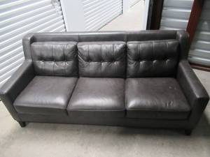 lot 1 image: ROOMS TO GO ITALIAN LEATHER COUCH MATCHES LOTS 2 & 3. MEASURES 80 X 35. RETAILS WITH NEXT 2 LOTS FOR $3000.00