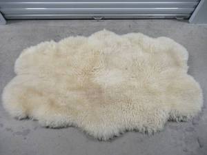 lot 5 image: KNIGHT SHEEPSKIN 100% PURE NEW WOOL MADE IN AUSTRALIA UNUSED AND VALUED AT $800.00