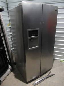 lot 32 image: FRIGIDAIRE GALLERY STAINLESS STEEL REFRIGERATOR MODEL# FGUS2642LF2. HANDLES HAVE BEEN REMOVED FOR THE MOVE BUT ARE THERE AND NEED REINSTALLING