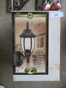 lot 50 image: HAMPTON BAY MOTION SENSING WALL LANTERN IN BLACK FINISH