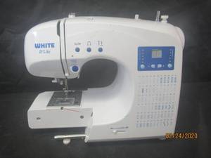 lot 35 image: WHITE DLITE SEWING MACHINE