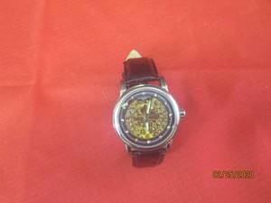 lot 8 image: PATEK PHILIPPE WATCH WITH LEATHER BAND