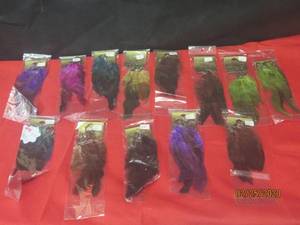 lot 56 image: 13 PAIR FEATHER EARRINGS