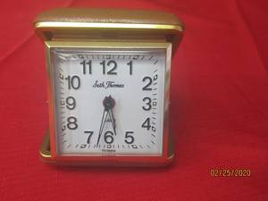 lot 65 image: VINTAGE SETH THOMAS TRAVEL ALARM CLOCK WITH HARD SHELL CASE