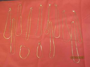 lot 84 image: 13 GOLD CHAINS ALL STAMPED J&S
