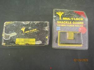 lot 92 image: NEW MUL-T-LOCK PADLOCK AND SHACKLE GUARD