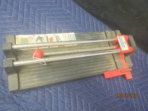 lot 213 image: PLASPLUGS PRO TILE FLOOR &amp WALL TILE CUTTER