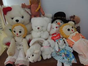 lot 43 image: Red checkered cloth doll, painted face, yellow pigtails ( 70 plus years old)  BASKET OF STUFF ANIMALS 