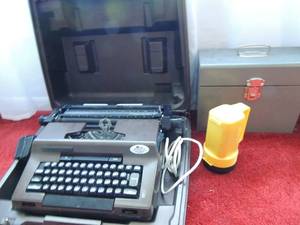 lot 38 image: SEARS COMMUNICATOR 1 TYPEWRITER , FLASHLIGHT  LOCK BOX
