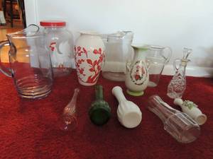 lot 92 image: DECOR - 3 CLEAR GLASS PITCHERS,    BUD VASES,  REDWHITE CERAMIC VASE,   CHINA VASE