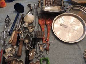 lot 99 image: KITCHEN UTENSILS - LADLES, ICE CREAM SCOOP, WOODEN SPOONS,  GRATER, MASHER, D   ALUMINUM TRAY,  SERVING TRAYS   CARSEN PEWTER DISH