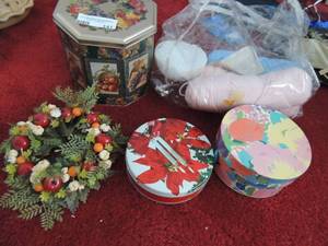 lot 141 image: DECORATIVE TINS X 3   PINK & BLUE YARN SKEINS,  SEWING NOTIONS