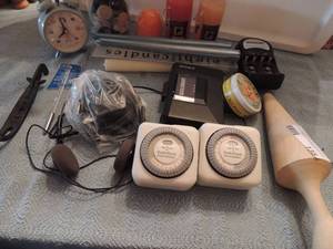 lot 135 image: JAR OF BUTTONS   CANDLES  X 7  CLOCKS   WOODEN PESTLE  PROGRAMMABLE PLUGS X 3   CHARGER  WALKMAN