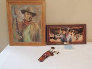 lot 64 image: John Wayne Straight Shooter art The Bradford Exchange 23x 11.5,   John WAYNE painted photo brown frame with rope accent 24x20 and John Wayne wall hanger Gun (decor only) The Duke