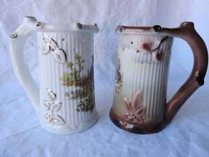 lot 78 image: GERFOLD PORZELLAN BAVARIA  PUZZLE STEIN - #1 DUCK DESIGN  WHITE,  #2 JACK RABBIT DESIGN  BROWN  - BOTH HAVE SEMI NUDE LITHO IN BOTTOM OF STEINS