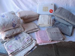 lot 122 image: Sheet sets for king bed 1 light green 1 cream 1 floral design a have matching pillow cases nice condition 1 embroidered king sheet set NIP 4 sets total