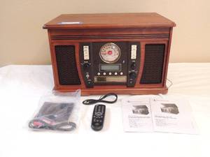 lot 52 image: WOODEN MUSIC CENTER WITH RECORDABLE CD PLAYER - INNOVATIVE TECHNOLOGY -  RADIO, CD PLAYER, TURNTABLE  -- NEW , CORDS, REMOTE  & MANEUL INCLUDED
