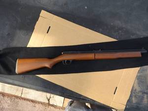 lot 43 image: Benjamin 397 .177 cal. rifle is a multi-pump pneumatic - Pellet Gun. , hardwood Monte Carlo stock  brass barrel is finished in black,  vary the velocity by the number of pumps (up to 8). 37 LENGTH