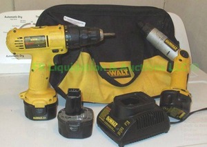 lot 14 image: DeWalt cordless drill and screwdriver with charger, battery and DeWalt tool bag