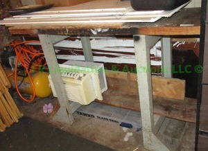 lot 24 image: Utility table, Heavy duty metal base soild wood top, 60 x 23 x 38 (contents not included)