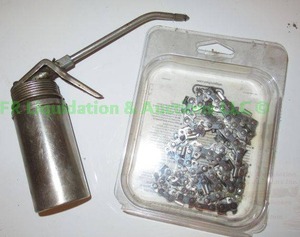 lot 53 image: Oregon 14 chain saw blade and oil pump can
