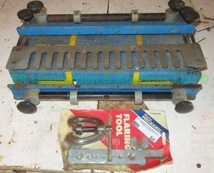 lot 64 image: TJL Industrial tile cutter and flaring tool in blister pack