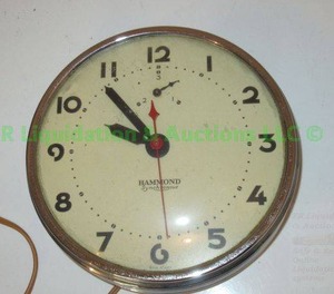 lot 71 image: Antique 1930s Art Deco Hammond Synchronous model 311 wall clock (not functioning)