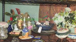 lot 96 image: Assorted ceramic and more decor plus, contents of shelf