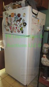 lot 100 image: Kenmore refrigeratorfreezer model 253.61872406. measures 66 x 30 x 30