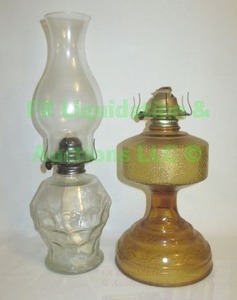 lot 251 image: Vintage glass hurricane oil lanterns