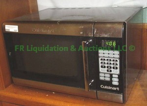 lot 107 image: Cuisinart microwave oven model CMW-100. measures 13 x 20 x 15