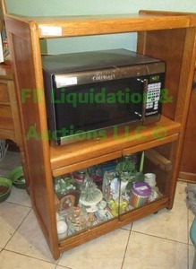 lot 106 image: Oak utility cabinet, 44 x 29 x 17