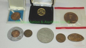 lot 187 image: Collectible coins including gold plated 1975 penny stamped 12-31-74 representing the date citizens could legally own gold again