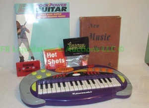 lot 160 image: Kawasaki mini keyboard and other music related items