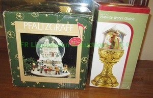 lot 212 image: Pfaltzgraff and Nativity musical snow globes