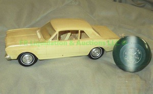 lot 227 image: 1966 Ford Falcon Futura toy car and classic Duncan yoyo