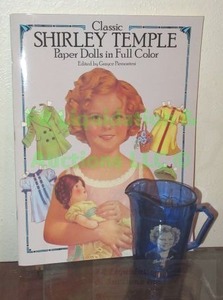 lot 262 image: Shirley Temple collectible doll book and matching cup