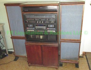 lot 138 image: Retro AMFM dual cassette stereo with turn table speakers and cabinet