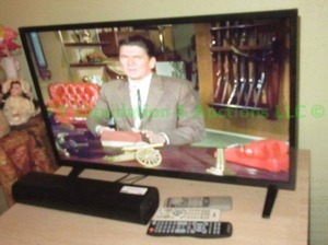 lot 142 image: Westinghouse television 29 x 19 and speaker sound bar